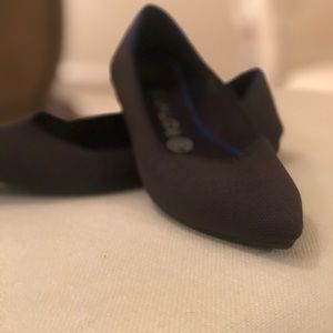 Rothy’s black flats.